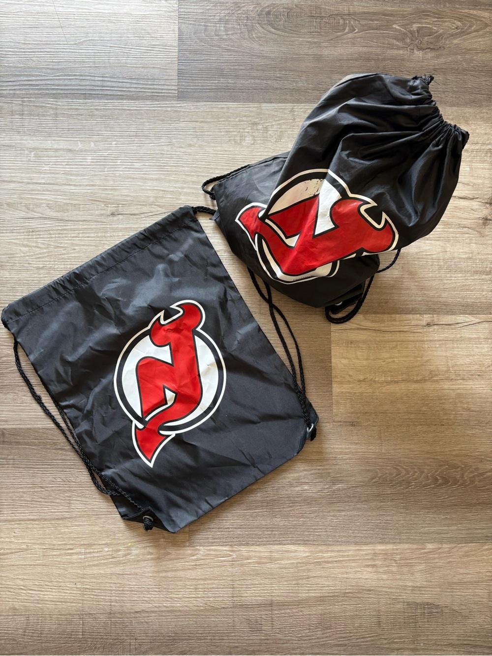 Lot of 2 New Jersey Devils NHL Drawstring Backpacks - Black/Red Cinch Bags